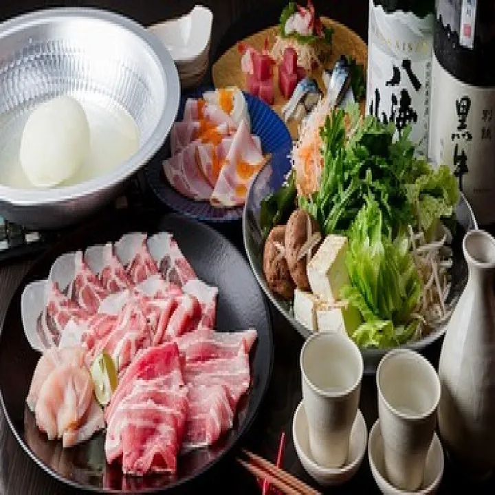 当店ならではの「たまねぎみぞれ鍋」お野菜を豚肉に巻き、お出汁...